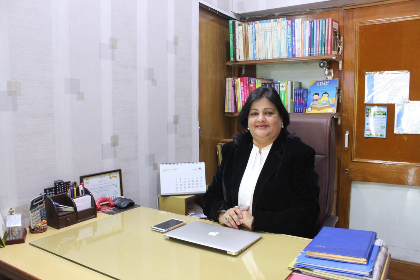 Mrs. Kumkum Rawat, Principal, at her desk